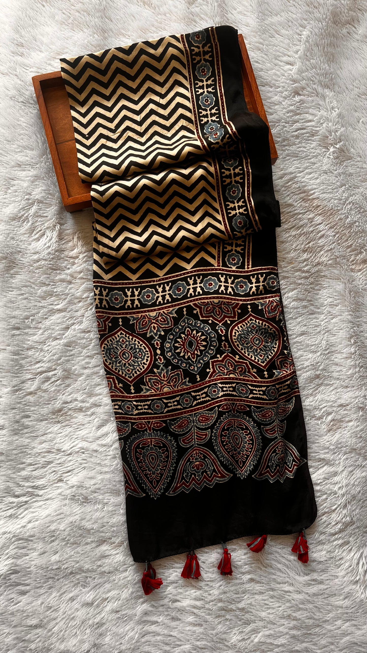 Off White and Black Zig Zag Ajrakh Hand Block Print Modal Silk Stole with Tassels