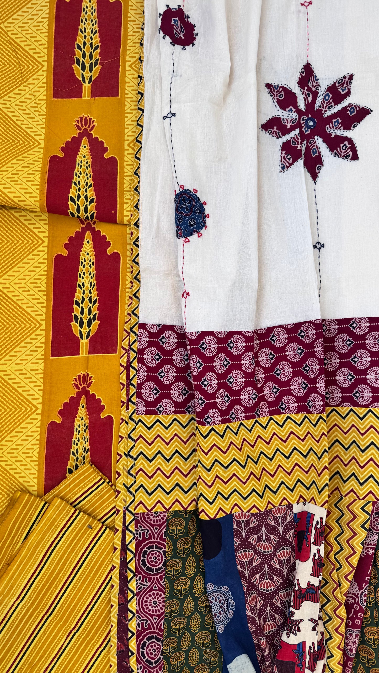 Yellow Ajrakh Pure Cotton Suit Set with Jharokha Motif and Off White Applique Cotton Dupatta