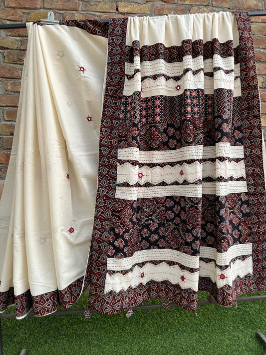 Off White and Black Pure CottonSaree with Ajrakh Applique Patchwork and Tassels