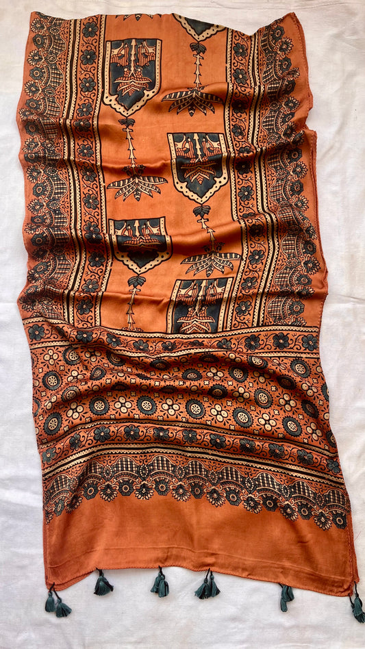 Kesari Jharokha and Kamdhenu Motif Ajrakh Hand Block Print Modal Silk Stole with Tassels