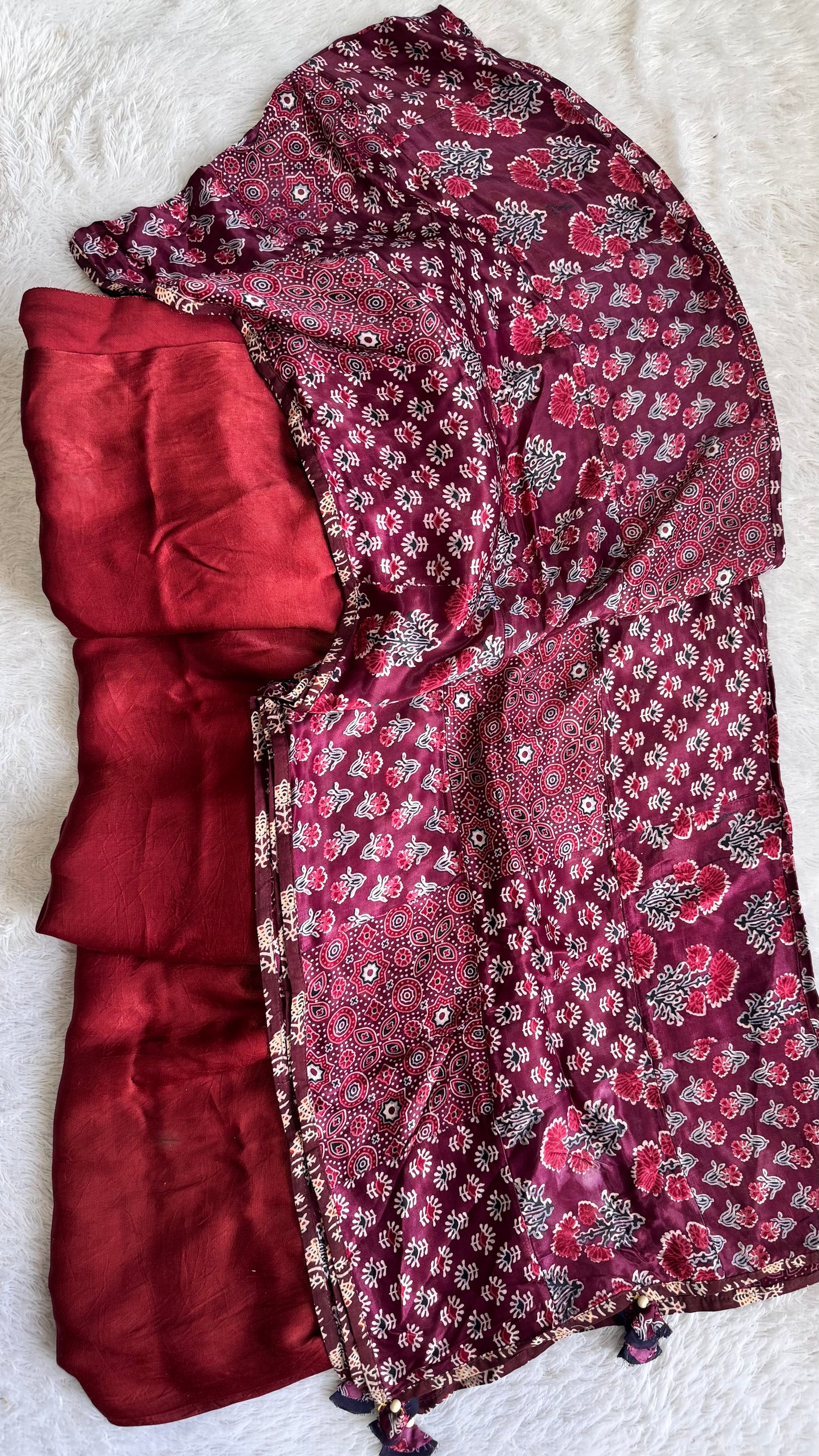 Ravishing Maroon Buta Motif Solid Modal Silk Suit with Ajrakh Applique Modal Silk Dupatta