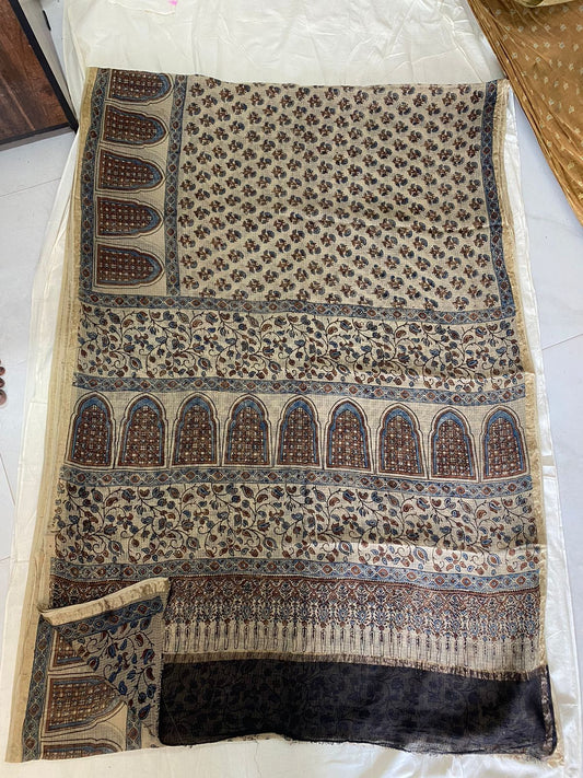 Cream Shade Ajrakh Handblock Printed Kota Doria Saree with Zari Border and Tassels