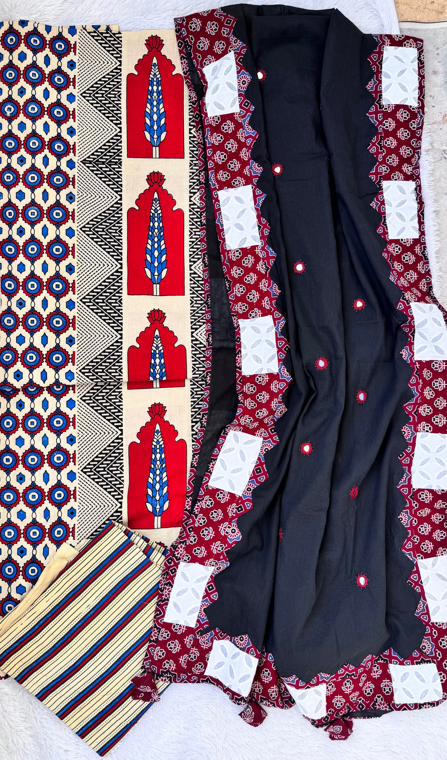 Off White Ajrakh Pure Cotton Suit Set with Chain Motif and Black Mirror Work Cotton Dupatta